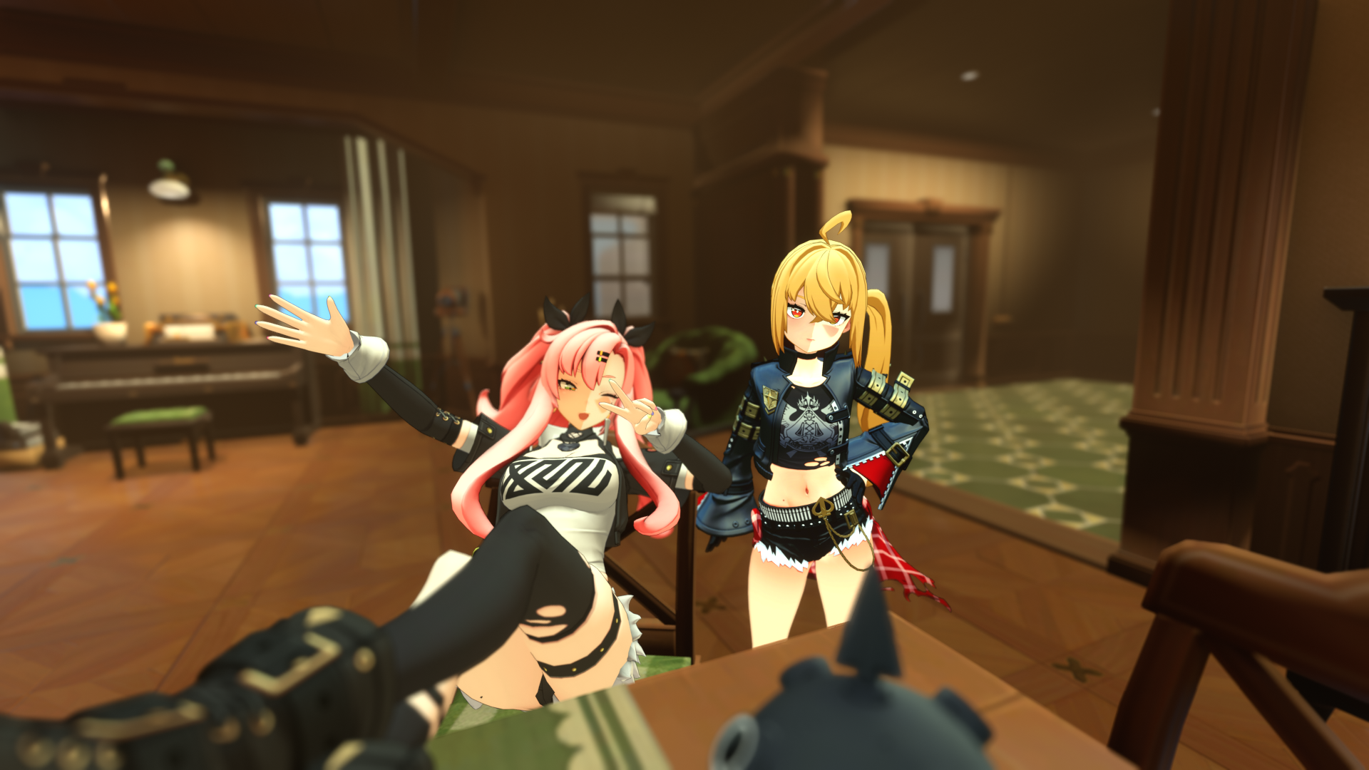 Nicole and Lucy posing in a warmly lit room